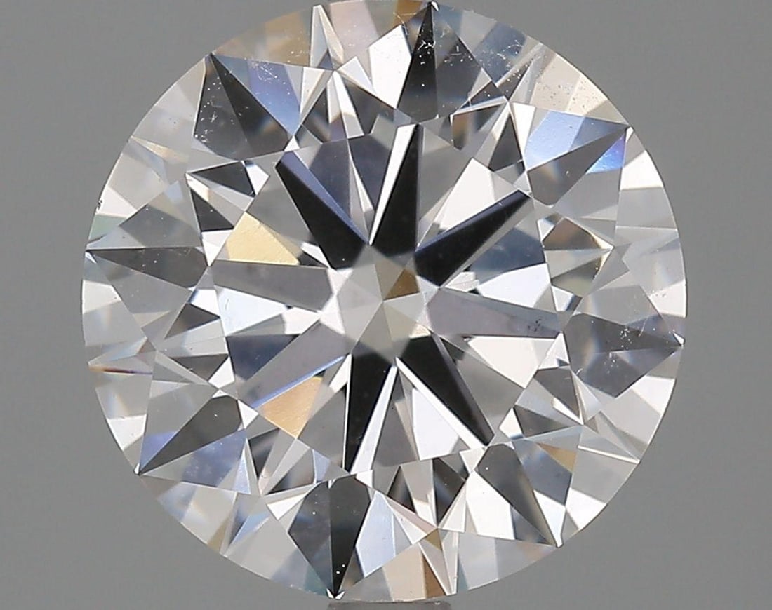 Lab Grown 3.53 ct, Color E/VS1 IGI Graded Diamond: Lab/Natural Diamond: Lab Carat Weight: 3.53 Color Grade: E Clarity Grade: VS1 Model: Round Brilliant Polish: Excellent Symmetry: Excellent Cut Grade: Ideal Size: 9.73 - 9.77 X 5.91 Certificate Number: