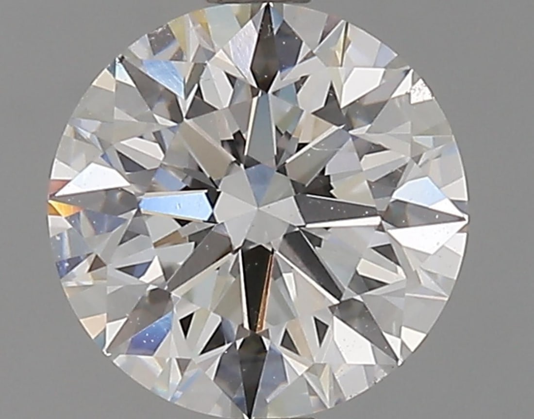 Lab Grown 1.8 ct, Color E/VS1 IGI Graded Diamond: Lab/Natural Diamond: Lab Carat Weight: 1.8 Color Grade: E Clarity Grade: VS1 Model: Round Brilliant Polish: Excellent Symmetry: Excellent Cut Grade: Excellent Size: 7.70 - 7.74 X 4.85 Certificate Numb