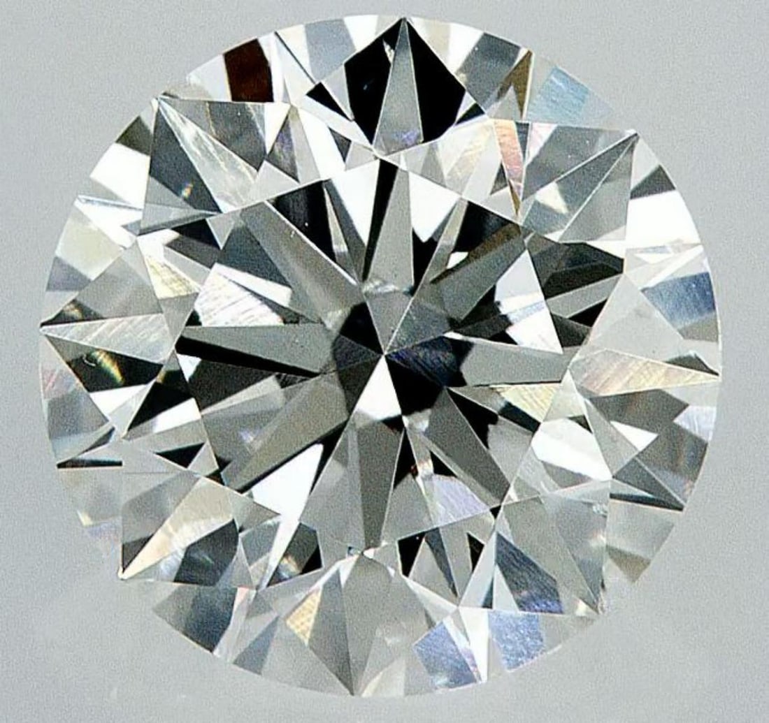 Lab Grown 2.89 ct, Color E/VS1 IGI Graded Diamond: Lab/Natural Diamond: Lab Carat Weight: 2.89 Color Grade: E Clarity Grade: VS1 Model: Round Brilliant Fluorescence: None Polish: Excellent Symmetry: Excellent Cut Grade: Ideal Size: 9.10 - 9.16 X 5.63