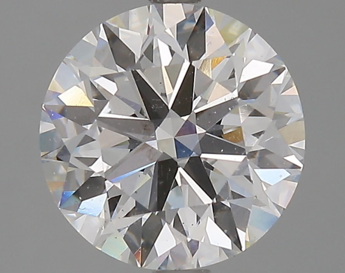 Lab Grown 2.93 ct, Color E/VS1 IGI Graded Diamond: Lab/Natural Diamond: Lab Carat Weight: 2.93 Color Grade: E Clarity Grade: VS1 Model: Round Brilliant Fluorescence: None Polish: Excellent Symmetry: Excellent Cut Grade: Ideal Size: 9.06 - 9.15 X 5.65