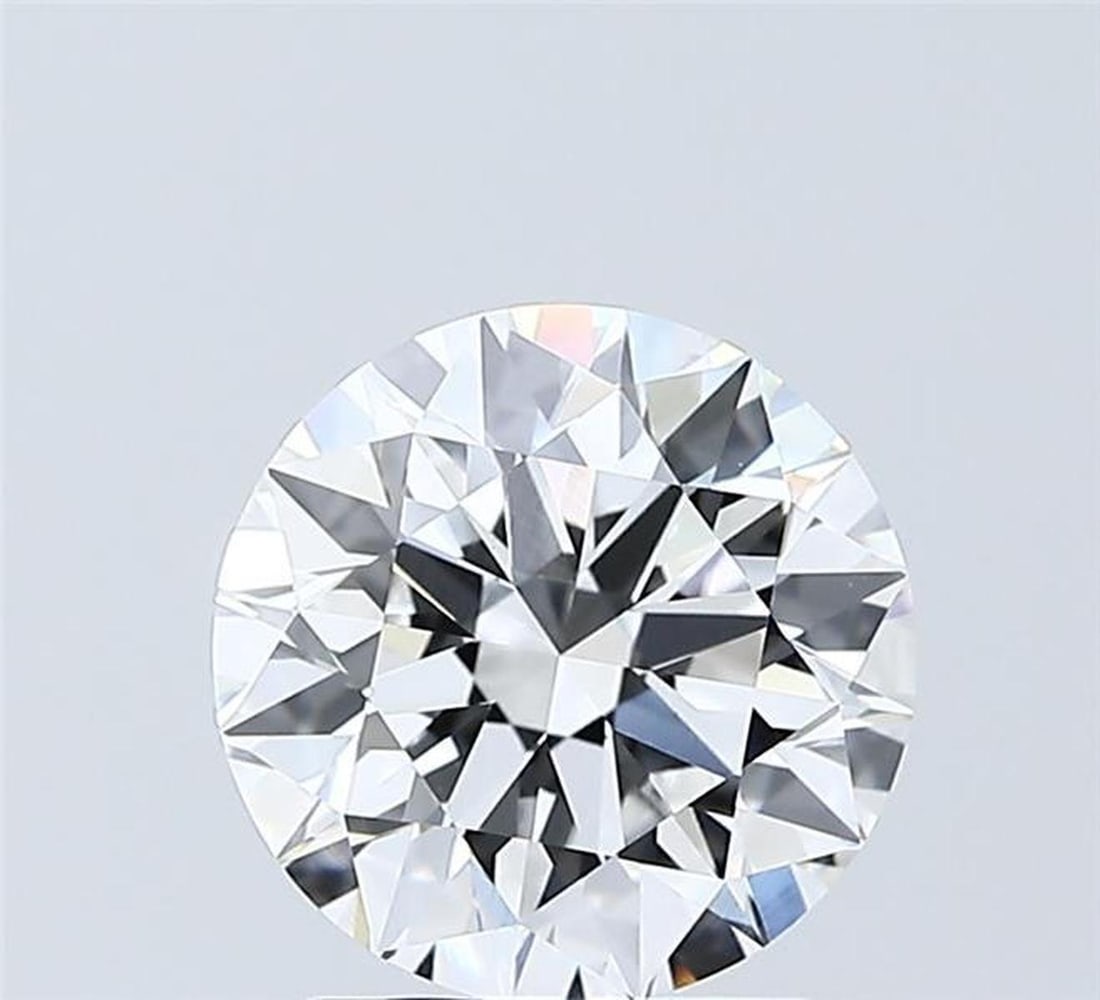 Lab Grown 2.02 ct, Color D/VVS2 IGI Graded Diamond: Lab/Natural Diamond: Lab Carat Weight: 2.02 Color Grade: D Clarity Grade: VVS2 Model: Round Fluorescence: N Polish: EXCELLENT Symmetry: EXCELLENT Depth: 62.7 Table: 58 Cut Grade: EXCELLENT Size: 8.02-