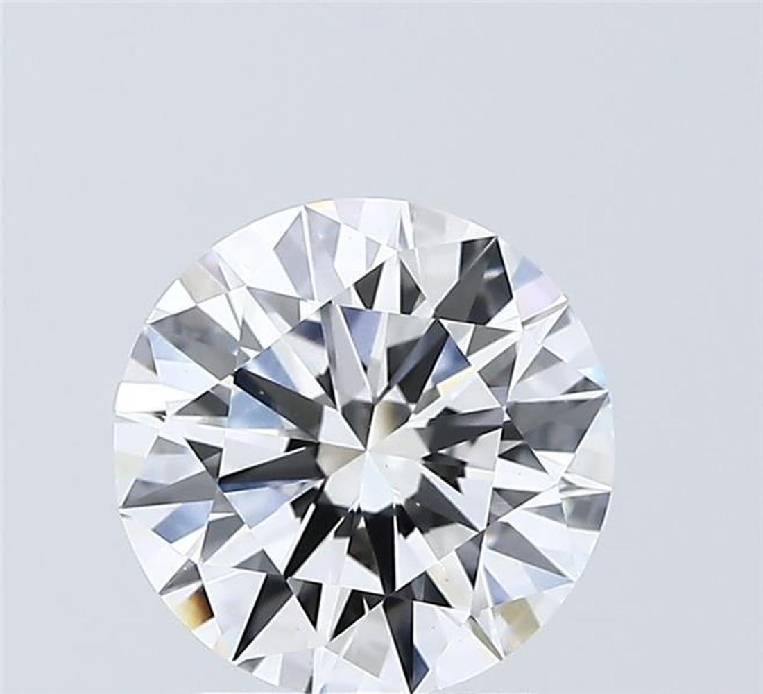 Lab Grown 1.03 ct, Color E/VVS2 IGI Graded Diamond: Lab/Natural Diamond: Lab Carat Weight: 1.03 Color Grade: E Clarity Grade: VVS2 Model: Round Fluorescence: N Polish: EXCELLENT Symmetry: EXCELLENT Depth: 59.3 Table: 60 Cut Grade: IDEAL Size: 6.58-6.59