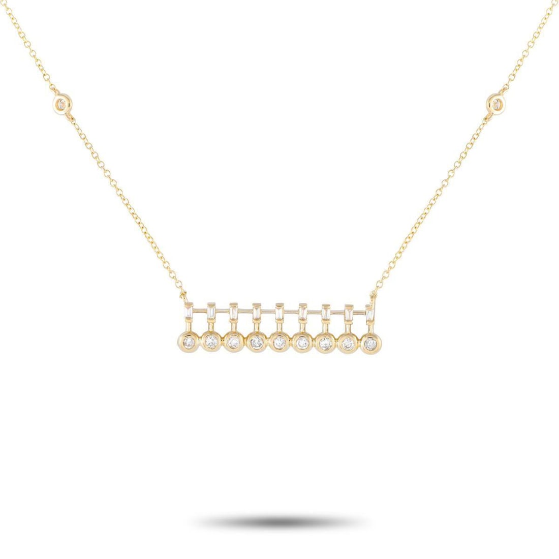 14K YELLOW GOLD 0.25CT DIAMOND BAR NECKLACE: A glittering jewel you can effortlessly take from office to dinner. This trendy piece features a 15 long chain with two bezel-set round diamond stations and a lobster clasp. It holds a horizontal pend