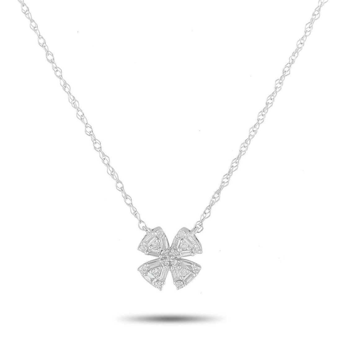 14K WHITE GOLD 0.20CT DIAMOND PENDANT NECKLACE: A clover-shaped pendant makes this 14K White Gold necklace a charming addition to any ensemble. Accented by Diamonds totaling 0.20 carats, the pendant measures 0.32 round and is suspended from an 18 c