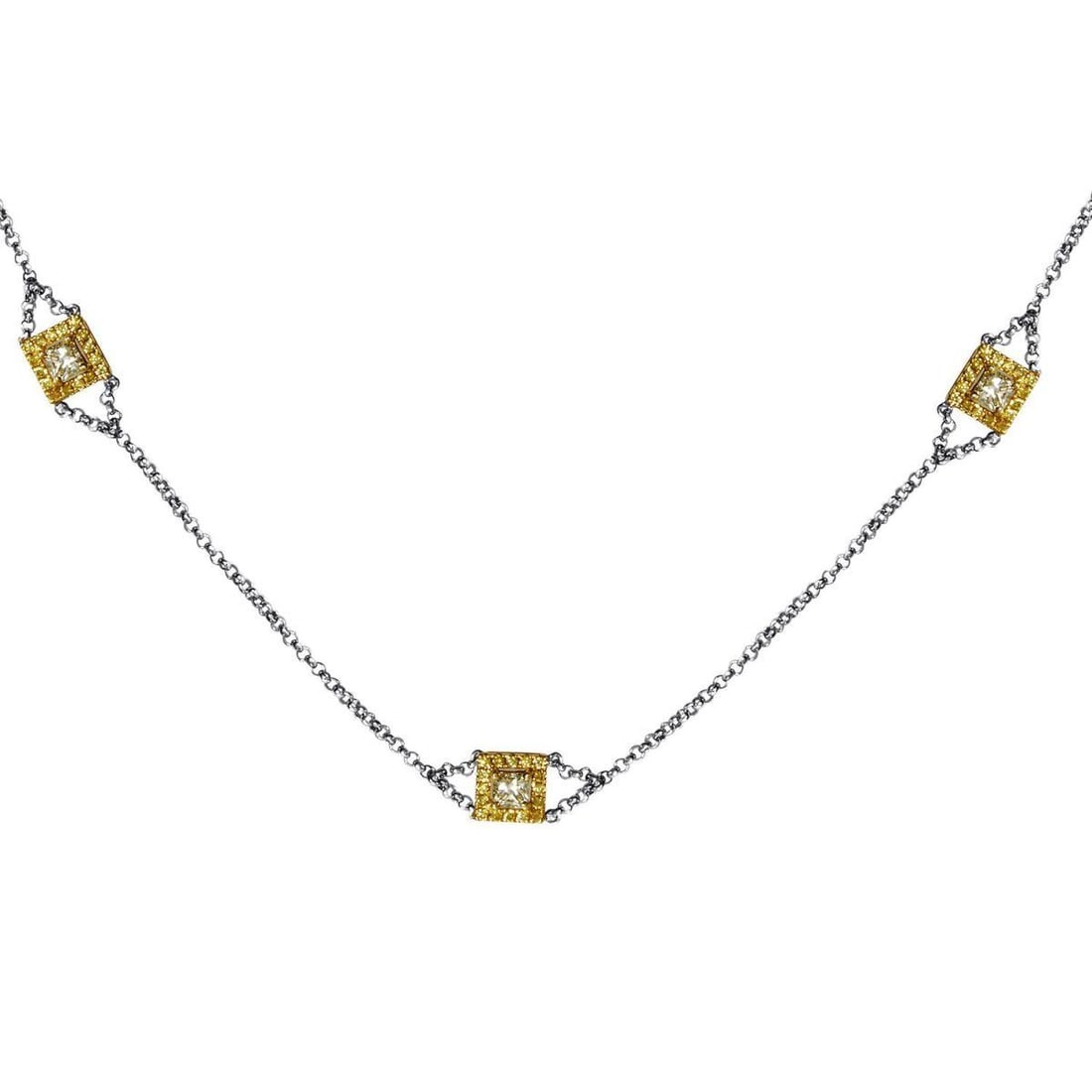 18K MULTI-TONE GOLD & DIAMOND NECKLACE: A touch of luxury to the power of three. Links of 18K White Gold are the connecting thread between three Yelllow Gold pendants. Each petite setting frames a bursting 1.40ct diamond setting. Category: