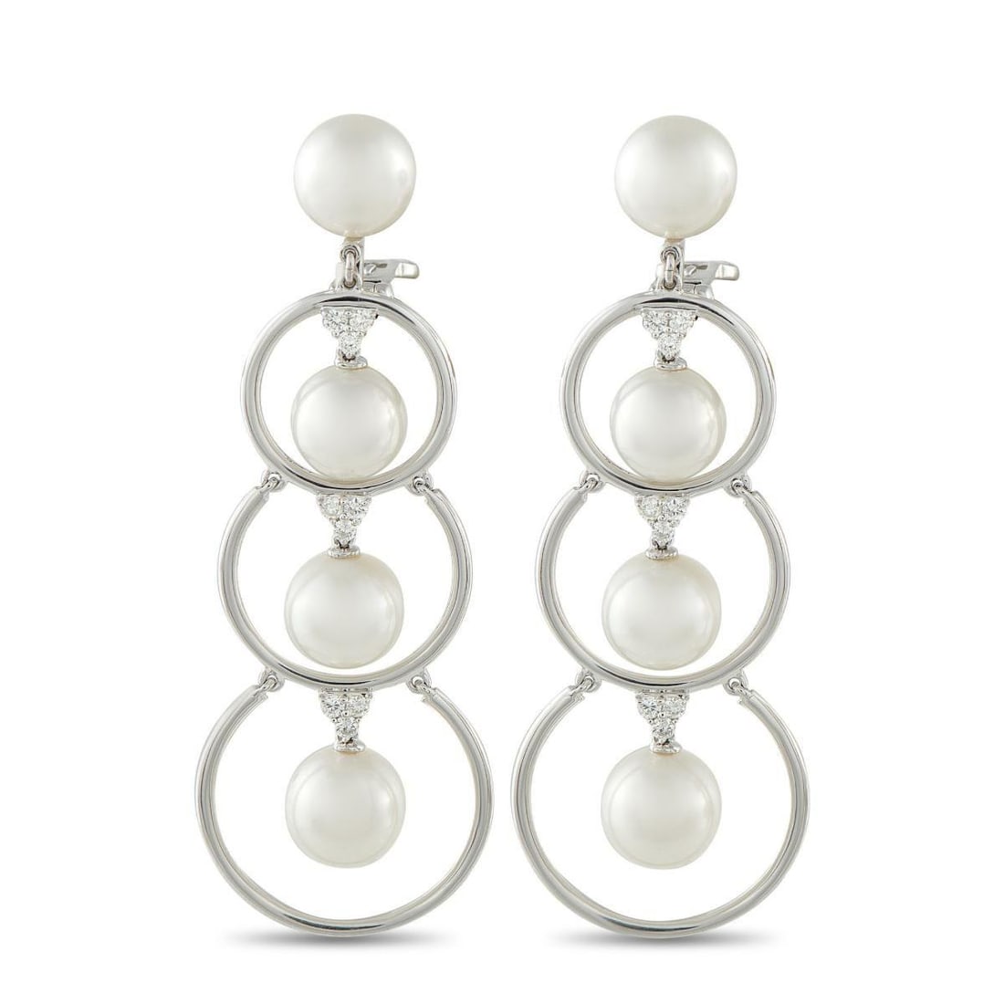 ASSAEL 18K WHITE GOLD 0.55CT DIAMOND AND PEARL CLIP-ON EARRINGS: These Assael earrings are incredibly luxurious. A series of delicate 18K White Gold hoops beautifully showcase 10mm Pearls. Diamond accents totaling 0.55 carats provide the perfect finishing touch. Ea
