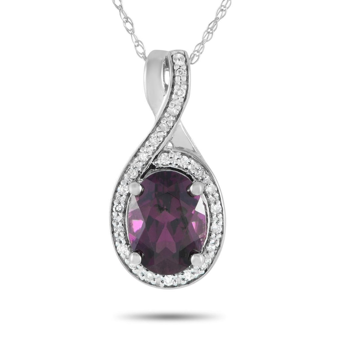 14K WHITE GOLD 0.11CT DIAMOND AND GARNET NECKLACE: At the center of this necklaces elegant 14K White Gold pendant, a captivating Garnet center stone shines to life thanks to additional Diamond accents totaling 0.11 carats. The pendant measures 0.75 lo