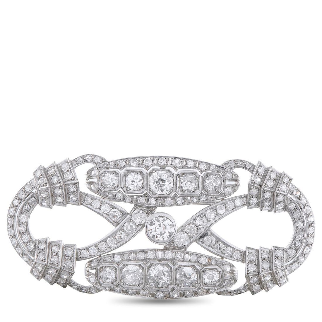 PLATINUM 9.0CT DIAMOND ART DECO BROOCH: An elegant openwork design makes this Art Deco brooch simply inspired. Incredibly detailed, the Platinum setting beautifully showcases Diamonds with a total weight of 9.0 carats. It measures 1.19 long