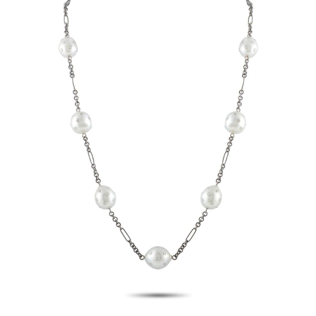 14K WHITE GOLD 4.46CT DIAMOND AND PEARL NECKLACE: A uniquely elegant design makes this luxury necklace simply unforgettable. An intricate 14K White Gold chain measuring 21 long provides the perfect foundation for this dynamic accessory. Featuring Pea