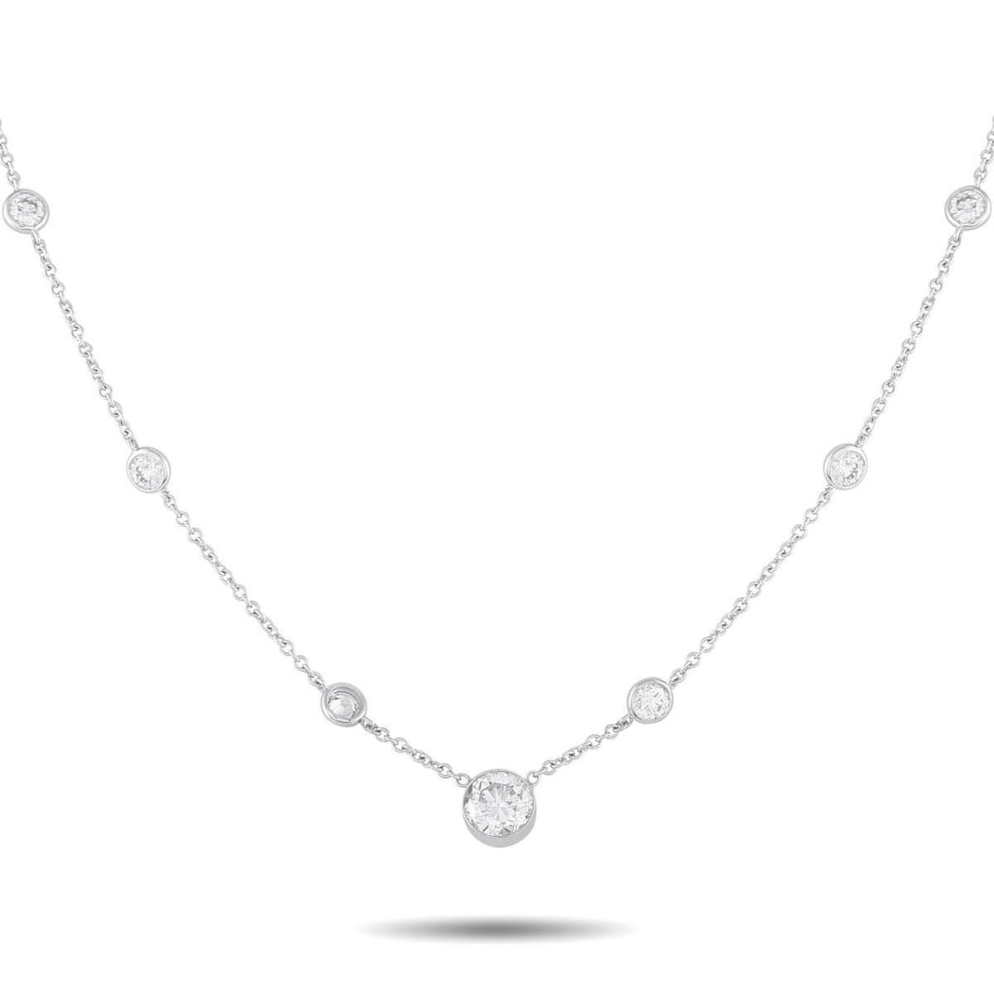 18K WHITE GOLD 3.50CT DIAMOND STATION NECKLACE: Bezel-set Diamonds make this elegant 18K White Gold necklace a stunning piece that will continually capture your imagination. The minimalist design features a 17.50 chain elevated by a series of Diamo