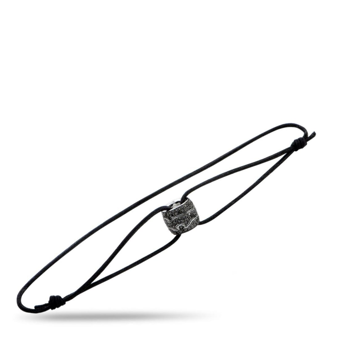 GEORG JENSEN FUSION 18K WHITE GOLD AND BLACK DIAMOND PENDANT CORD BRACELET: Distinctly offbeat with a subtle touch of unconventional luxury, this fascinating bracelet designed by Georg Jensen will give a stunningly fashionable twist to your outfits. The bracelet features a st