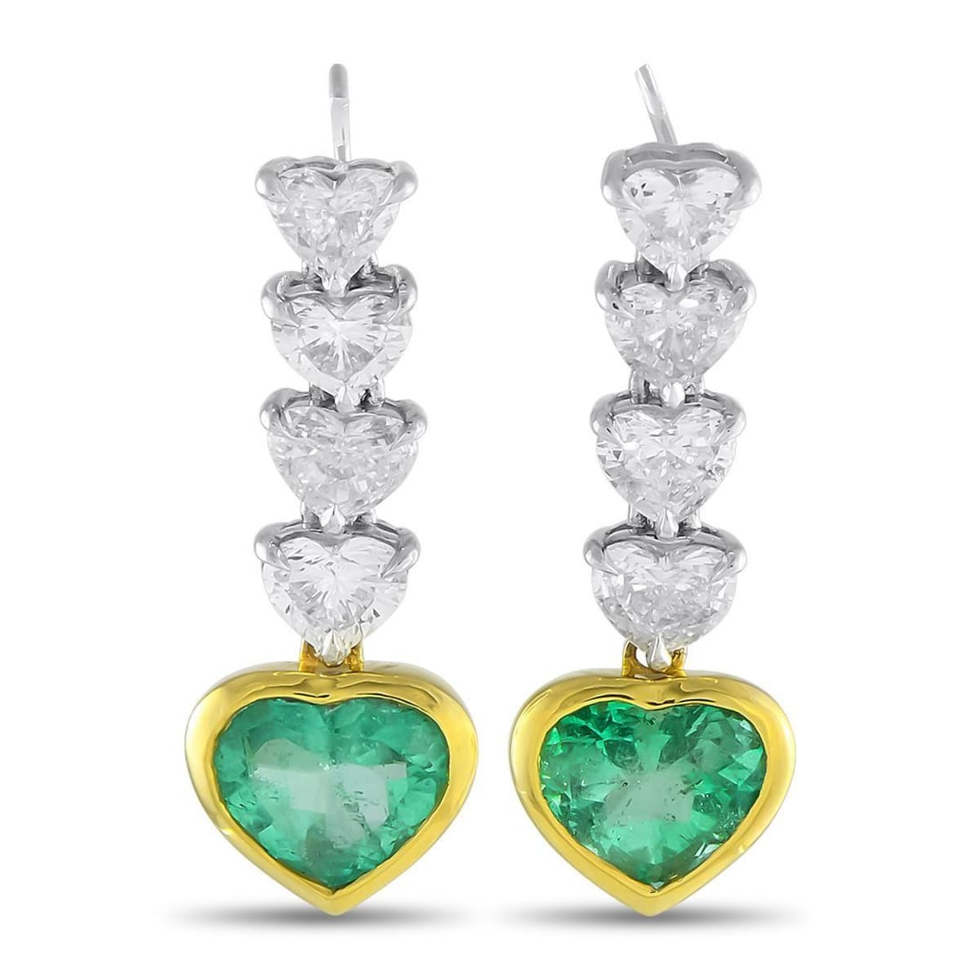 PLATINUM AND 18K YELLOW GOLD 3.28CT DIAMOND AND EMERALD DANGLE EARRINGS: These luxury earrings are nothing short of breathtaking. Crafted from a combination of 18K Yellow Gold and Platinum, heart-shaped Diamonds with a total weight of 3.28 carats offer impressive sparkle e