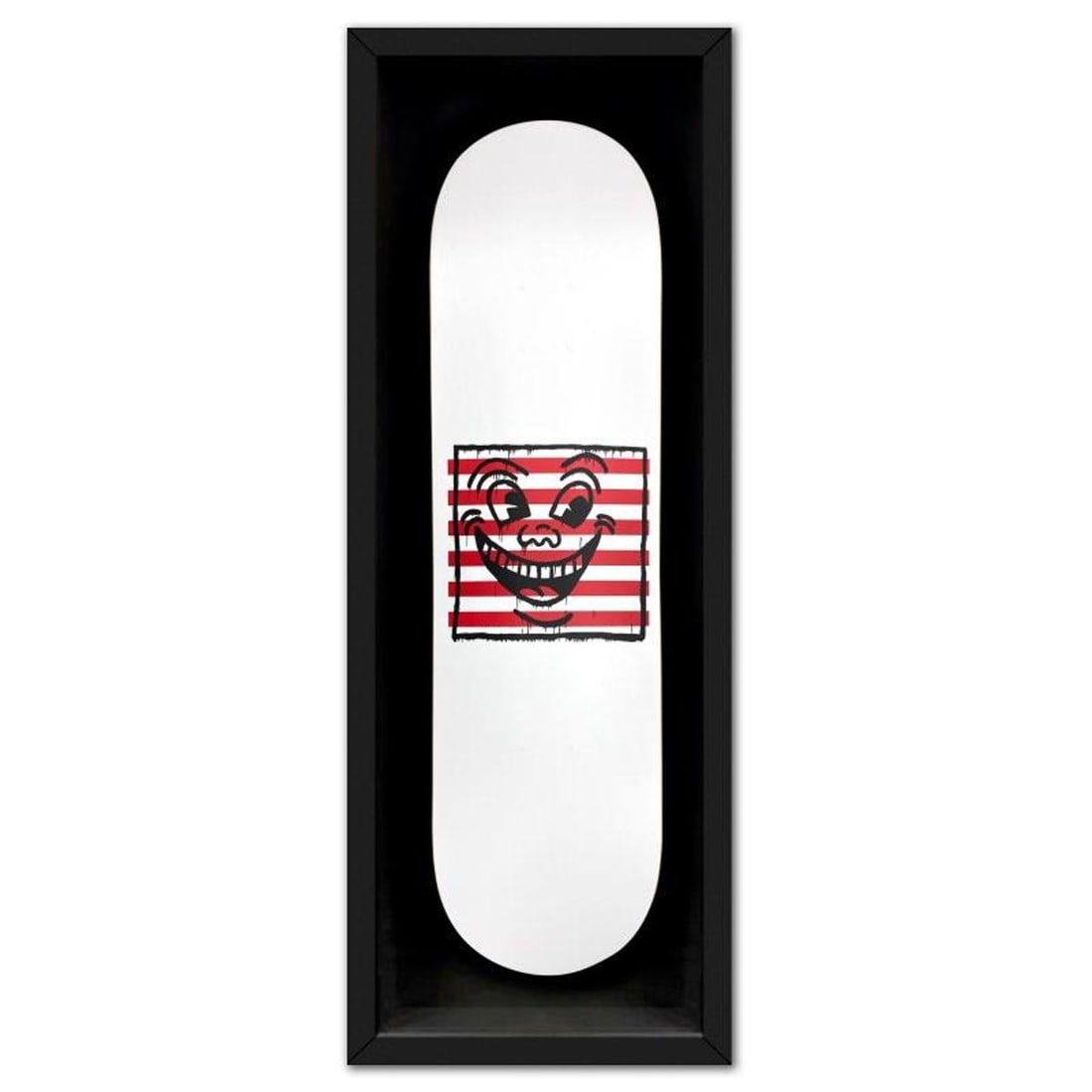 Keith Haring (1958-1990), "Untitled (Smile On Stripes)" Framed Skateboard, Plate Signed with Letter (1 of 2)
