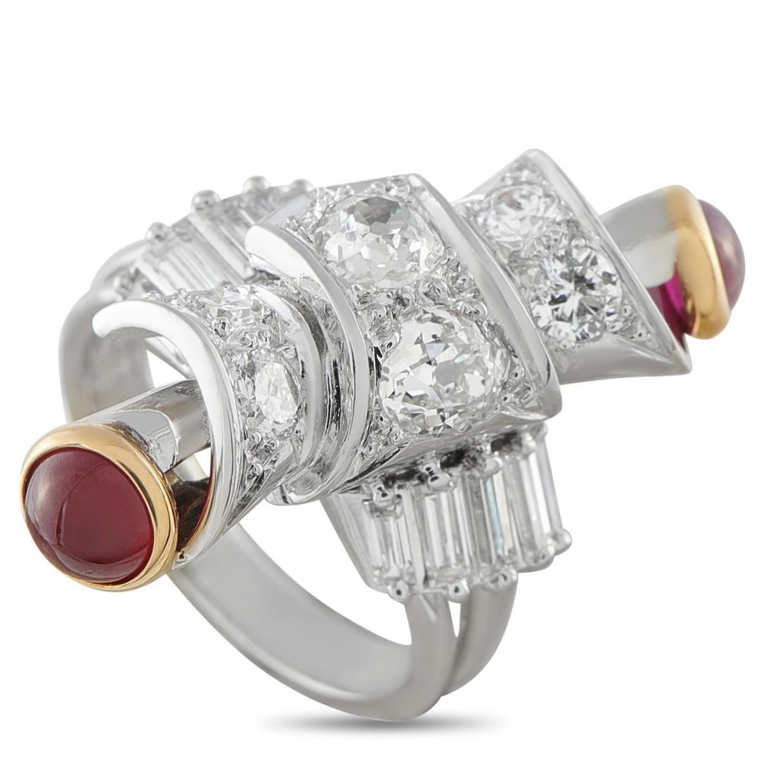 18K WHITE GOLD 2.50CT DIAMOND AND RUBY RING: A sculptural design makes this ring simply unforgettable. Incredibly chic, the unique 18K White Gold setting comes to life thanks to inset Diamonds totaling 2.50 carats. Ruby cabochons at each end anc