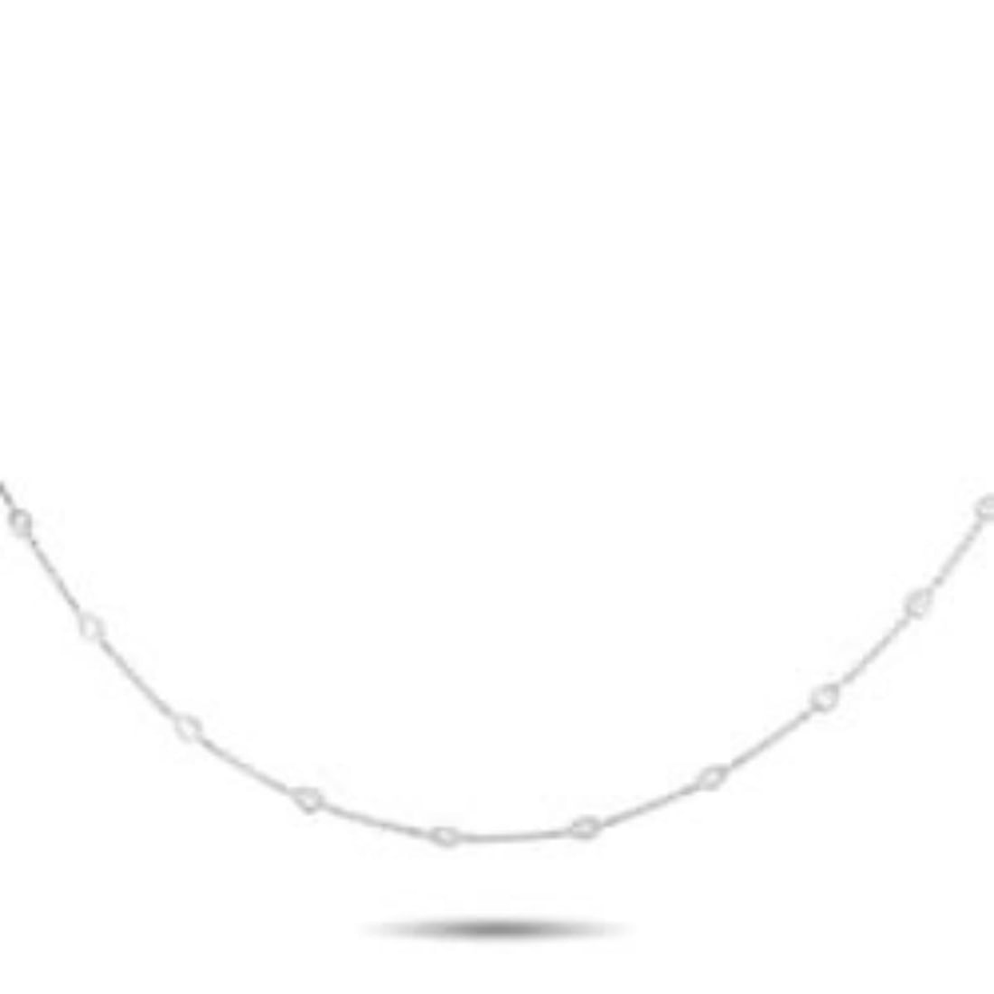 18K WHITE GOLD 1.85CT DIAMOND STATION NECKLACE: Pear-shaped Diamonds with a total weight of 1.85 carats allow this elegant necklace to effortlessly catch the light. Crafted from 18K White Gold, it measures 17.5 long and is ideal for any occasion.Th