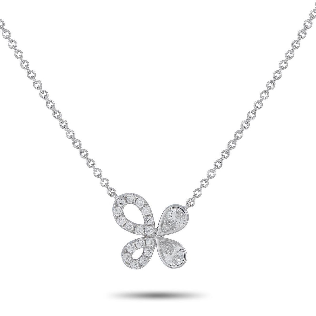 18K WHITE GOLD 0.95CT DIAMOND PENDANT NECKLACE: This exquisite necklace offers a stylish sense of fluidity. Crafted from 18K White Gold, Diamonds with a total weight of 0.95 carats add elegance to the stunning, asymmetrical pendant. The pendant mea