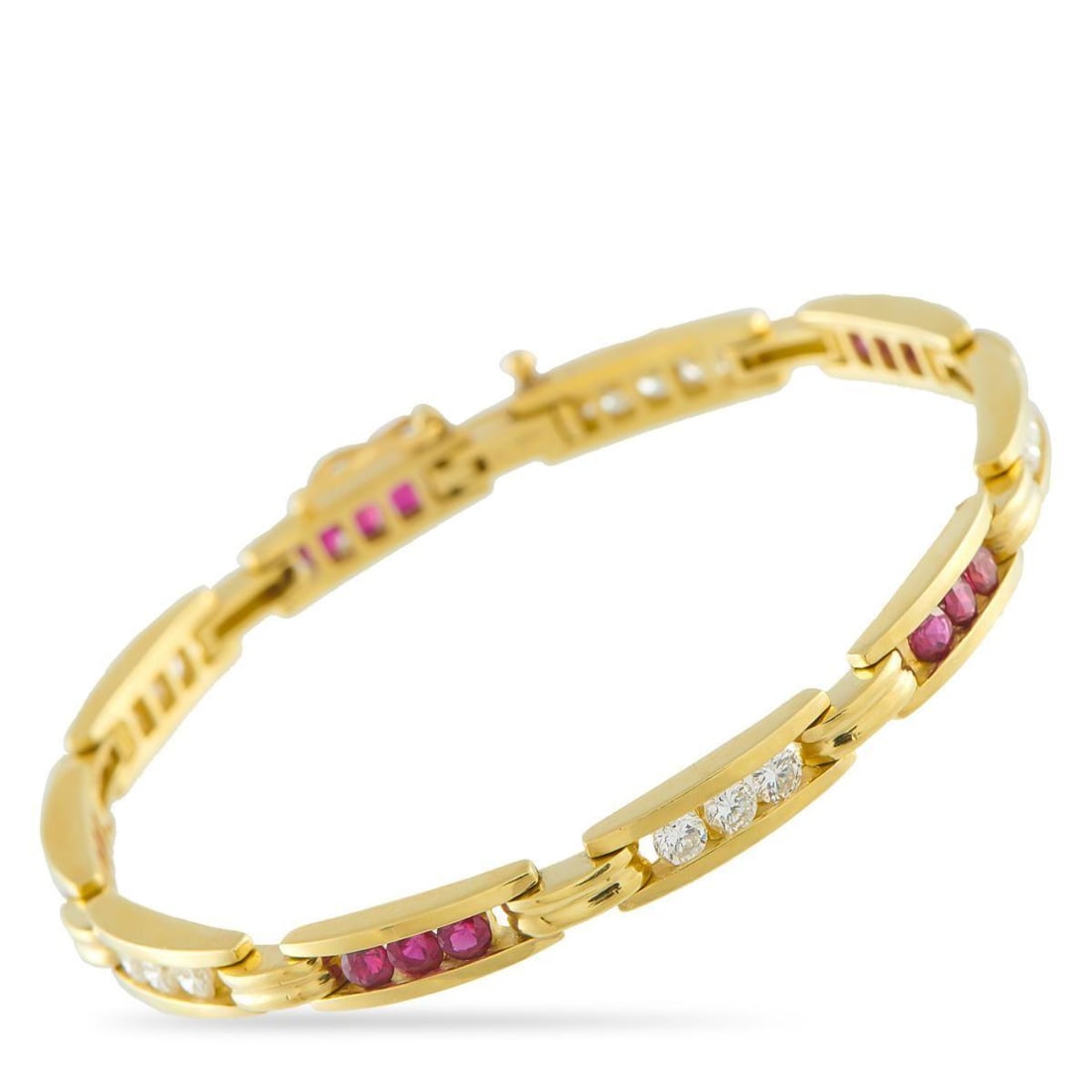 18K YELLOW GOLD 1.0CT DIAMOND AND RUBY BRACELET: This luxury bracelet is perfectly understated. Channel-set Diamonds with a total weight of 1.0 carats sparkle from their place within the delicate 18K Yellow Gold setting. Ruby gemstones totaling 1.25