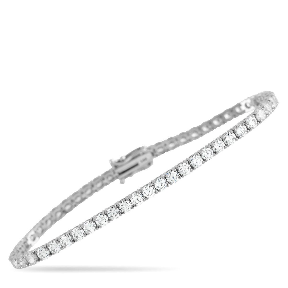 14K WHITE GOLD 6.50CT LAB-GROWN DIAMOND TENNIS BRACELET: This sparkling tennis bracelet is an instant classic. A series of Lab Grown Diamonds with a total weight of 6.50 carats make this the perfect way to add a touch of luxury to any ensemble. Set in 14K W