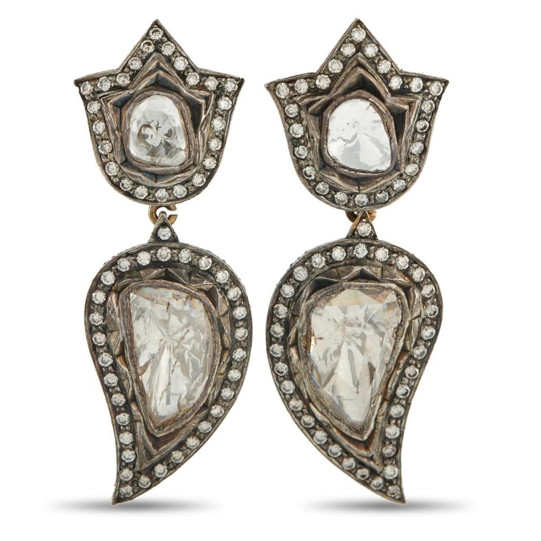 18K YELLOW GOLD AND SILVER 7.65CT DIAMOND EARRINGS: These earrings are bold, dramatic, and incredibly eye-catching. Crafted from a combination of 18K Yellow Gold and Silver, Diamonds with a total weight of 7.65 carats allow them to continually catch th