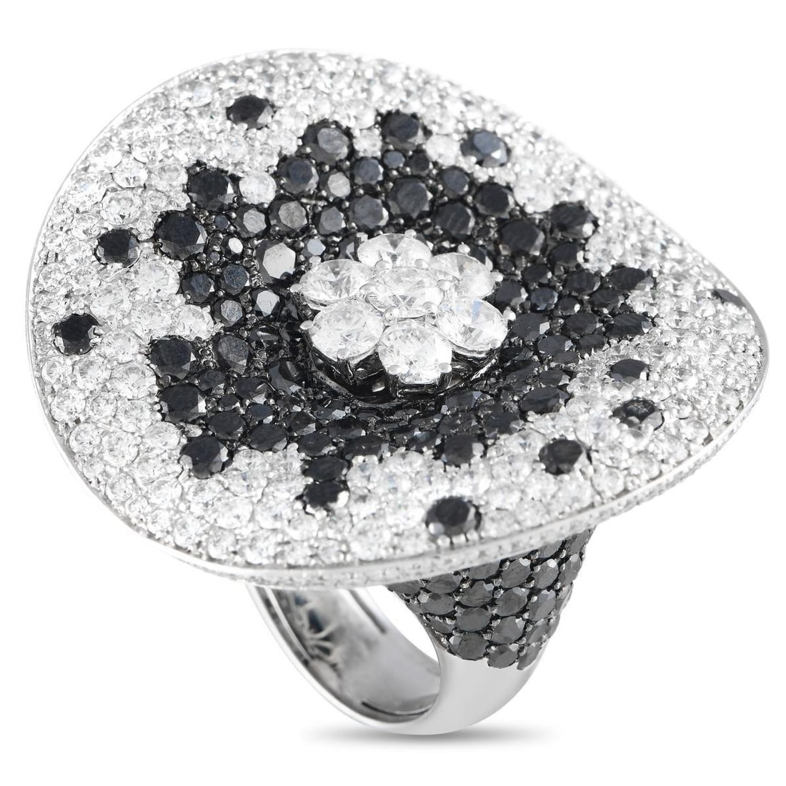 MAGGIORO 18K WHITE GOLD 16.57CT BLACK AND WHITE DIAMOND COCKTAIL RING: This delightful display ushers in visions of summer with a divine blend of white and black diamonds. 4.69ct white diamonds are given sharp contrast against sprinklings of 11.88ct black diamonds across