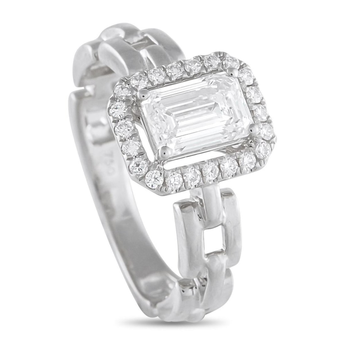 18K WHITE GOLD 1.25CT DIAMOND SQUARE LINK RING: This piece sets its 1.05-carat emerald-cut diamond center stone apart with intention. Four claw prongs hold the central gem high, leaving a slim gap before the halo of round diamonds begins. The space