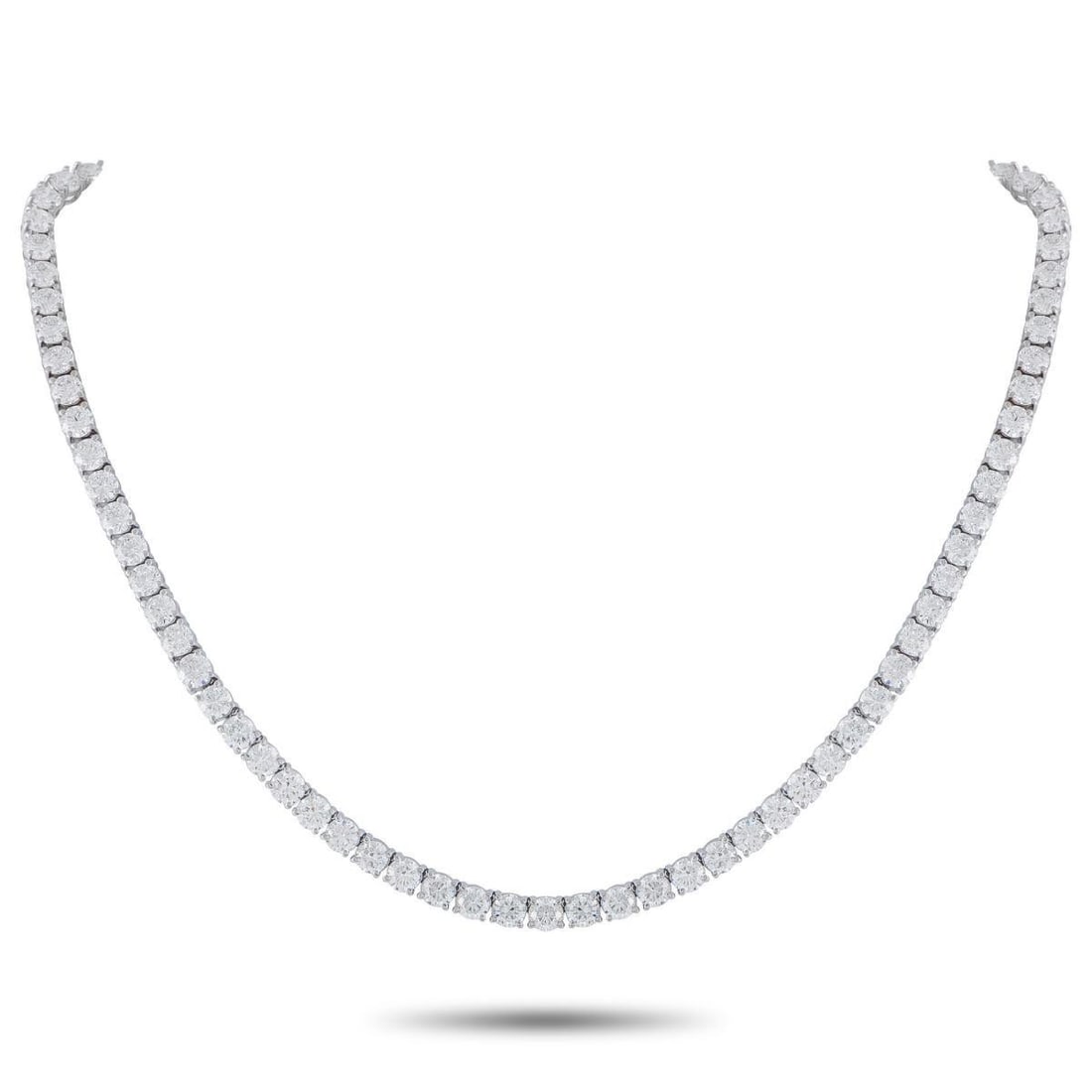 18K WHITE GOLD 35.25CT DIAMOND NECKLACE: A series of round-cut Diamonds with a total weight of 35.25 carats make this luxury necklace come alive every time it catches the light. Crafted from 18K White Gold, this scintillating accessory is a