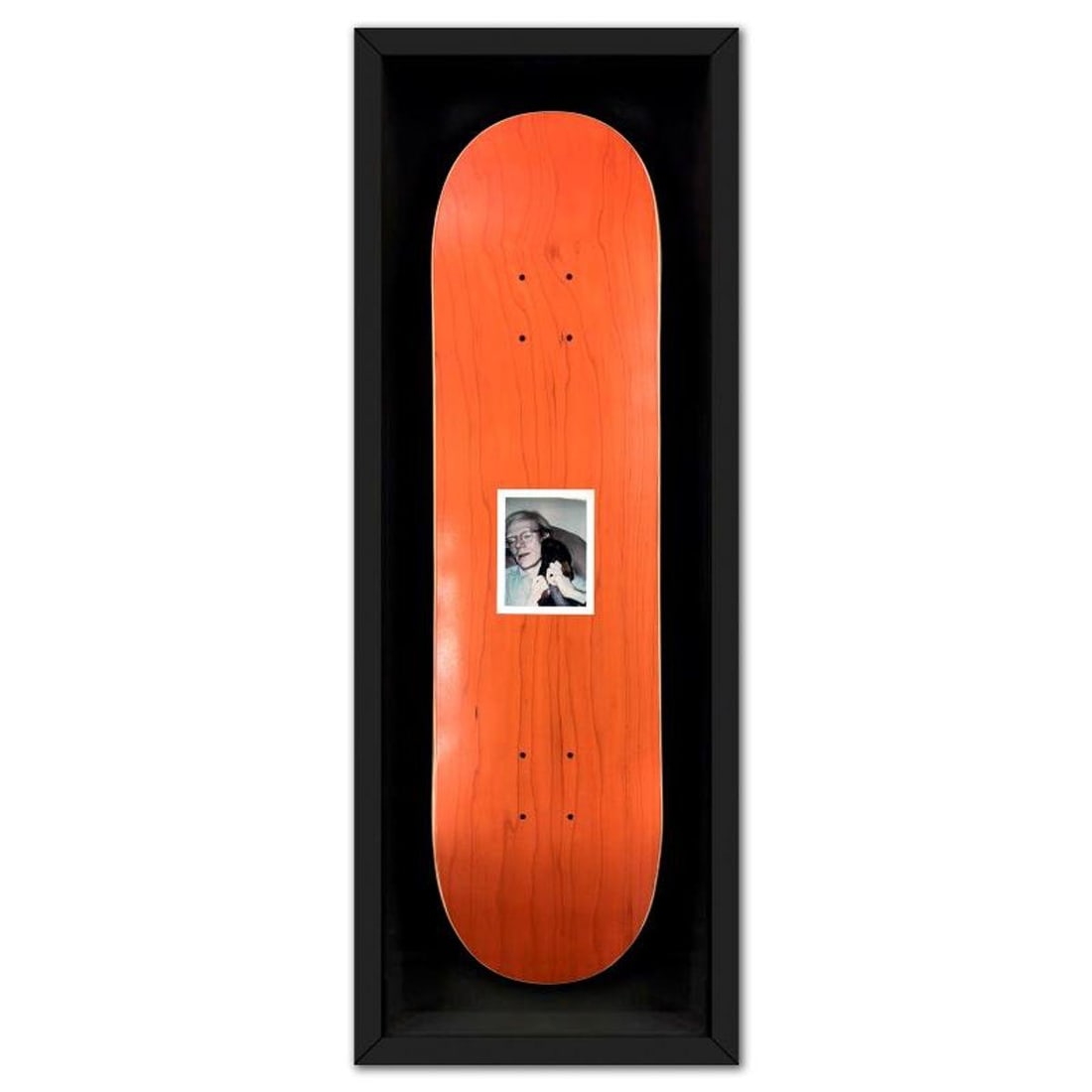 Andy Warhol (1928-1987), "Self-Portrait (Orange)" Framed One-of-a-Kind Unique Edition Skateboard,: Self-Portrait (Orange) is a one-of-a-kind unique edition skateboard by Andy Warhol (1928-1987), bearing the plate signature inverso of the artist. This piece comes custom framed. This piece is from a