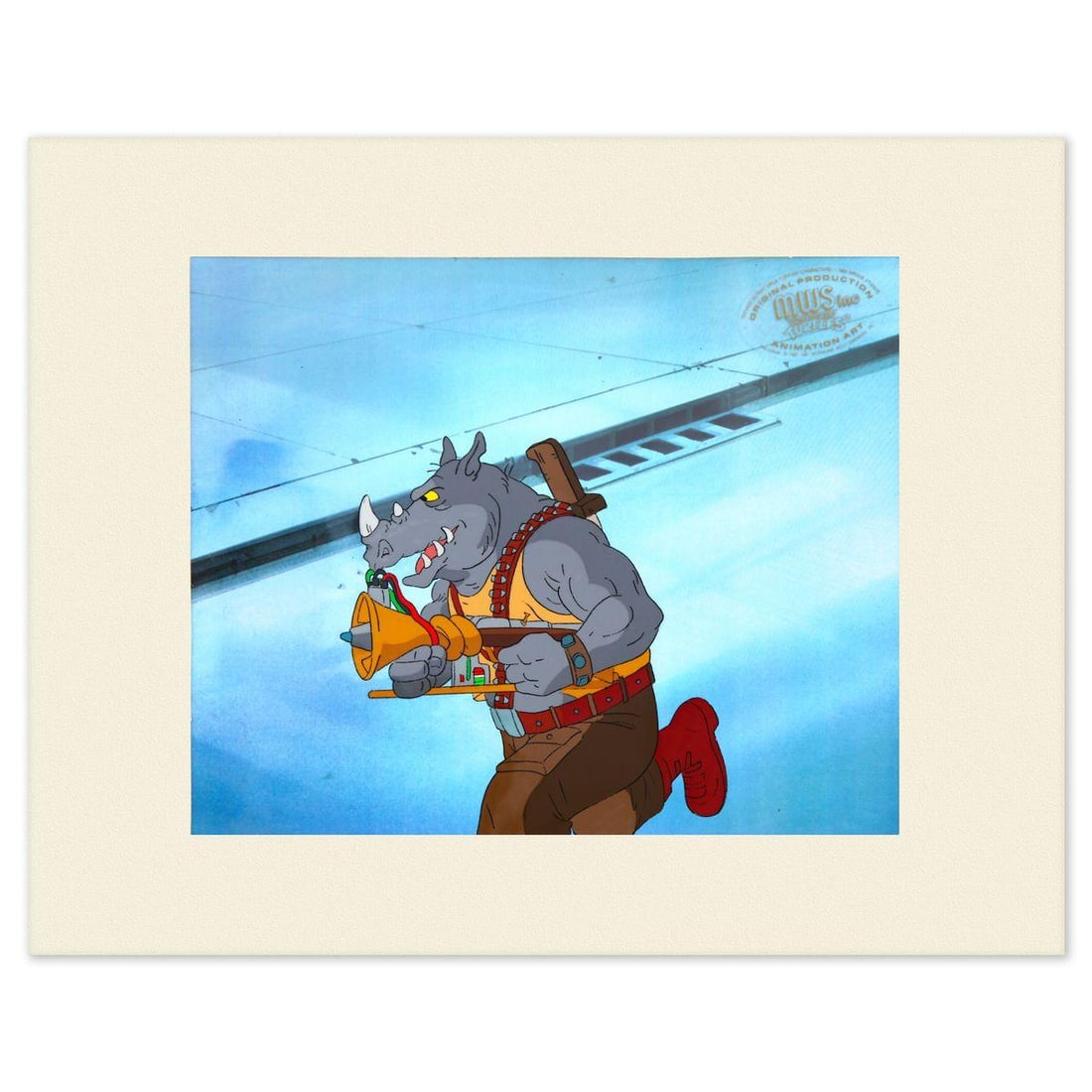 Animation Art- Hand-Painted Cel "Rocksteady": Artist: Animation Art. Medium: Hand-Painted Cel. Title: Rocksteady. Size: 8" x 9". Certificate of Authenticity: Is included. Additional: Matted and ready to frame. Portfolio: Teenage Mutant Ninja Turt