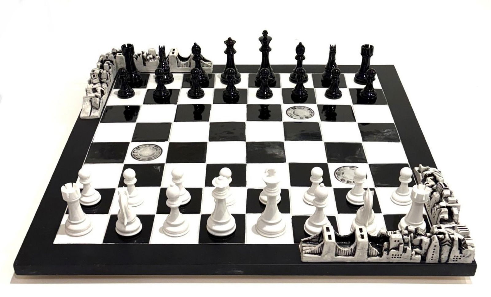 Charles Fazzino- Chess Set: Artist: Charles Fazzino. Medium: Chess Set. Size: 26" x 26". Signature: Hand signed. Additional: The Chess board is an original Fazzino product the chess pieces are aftermarket. Reference#: 33300.