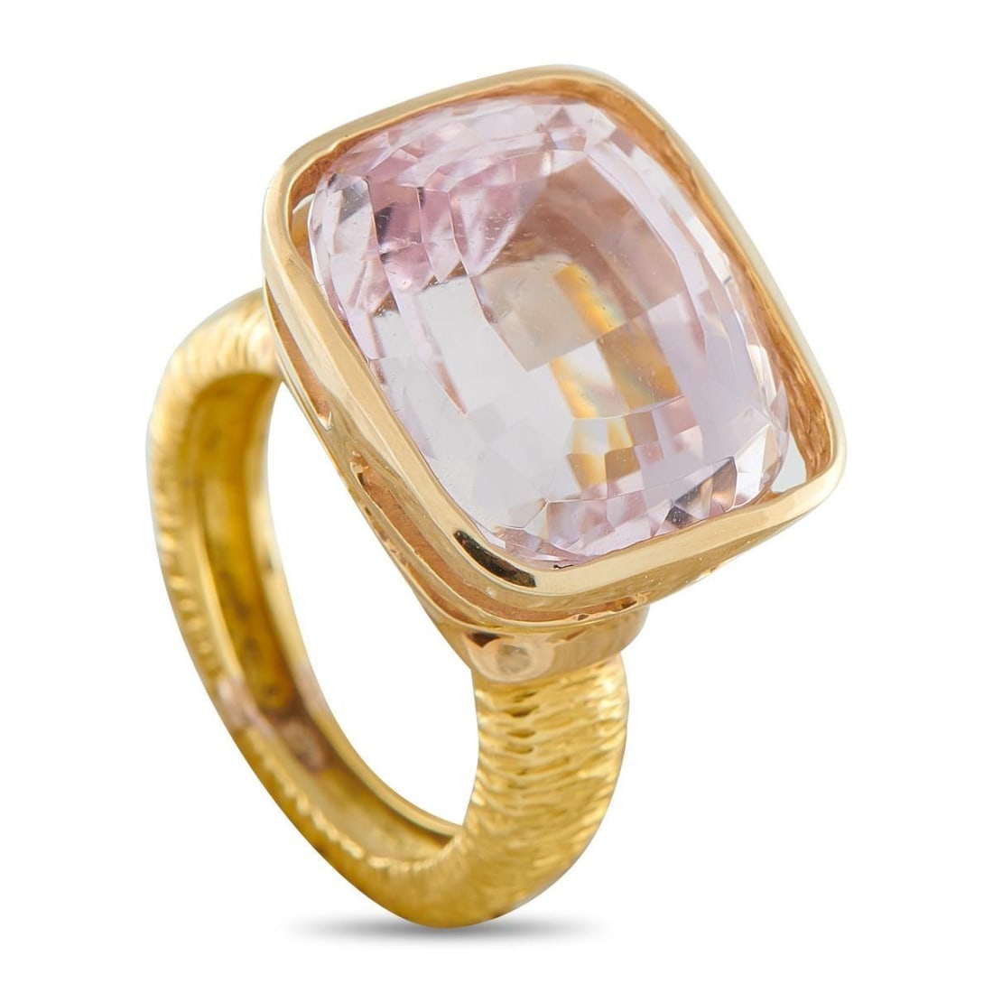 18K YELLOW GOLD 16.0CT KUNZITE RING: A translucent 16.0 carat Kunzite center stone makes this luxury ring simply breathtaking. Bold and incredibly impressive, the textured 18K Yellow Gold setting ensures its elegant from every angle. It