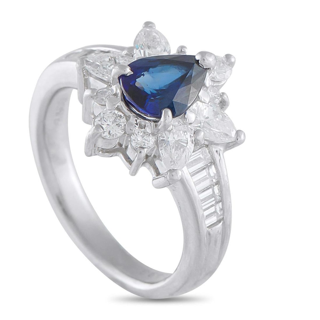 PLATINUM 0.98CT DIAMOND AND SAPPHIRE RING: A 0.98 carat pear-shaped Sapphire serves as a stunning focal point on this elegant ring. Set in Platinum, Diamonds with a total weight of 0.98 carats make it even more breathtaking to behold. It featu