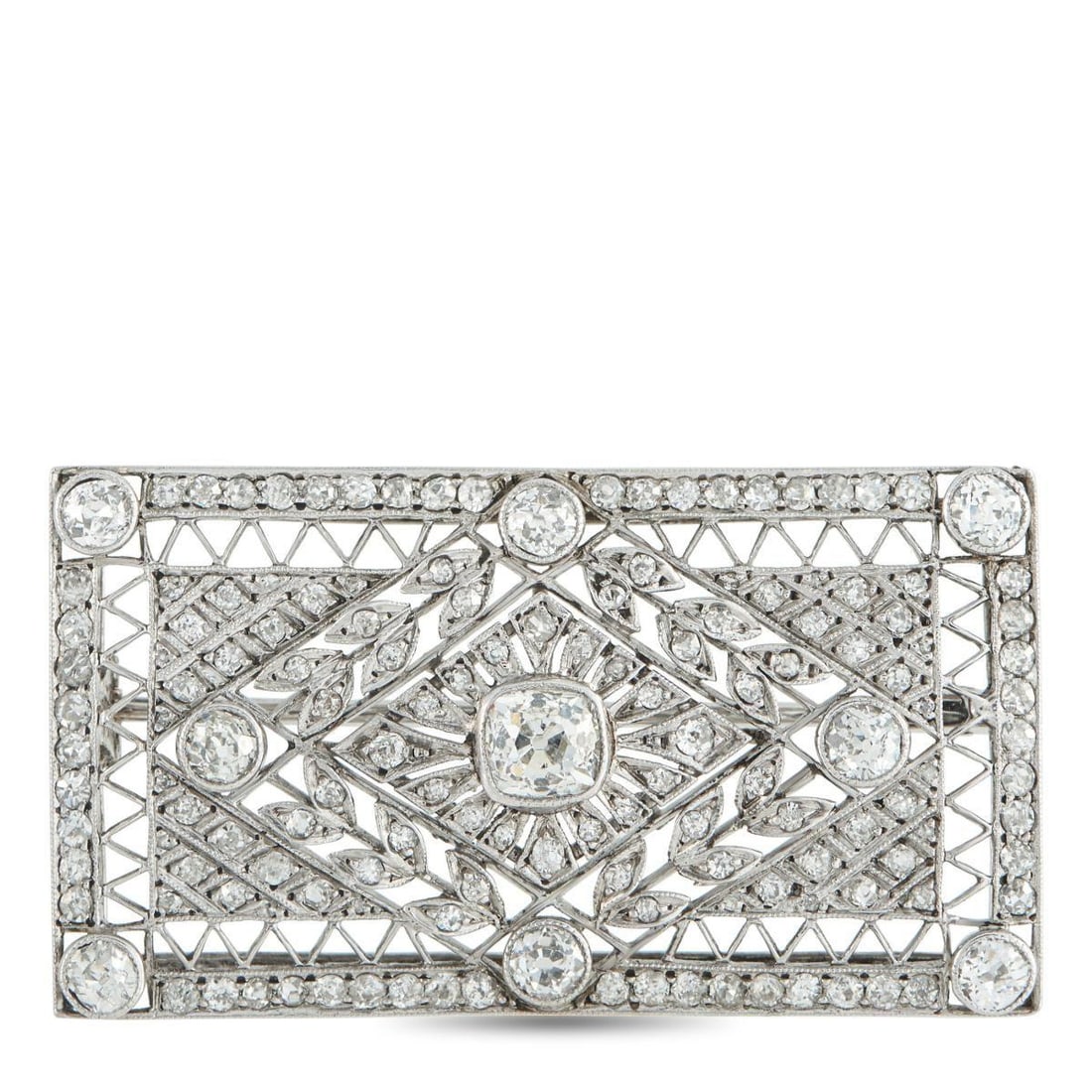 PLATINUM 3.0CT DIAMOND BROOCH: With an intricate openwork design, this luxury brooch draws inspiration from the Art Deco era. A dazzling array of Diamonds totaling 3.0 carats shine brightly from their place within the Platinum sett