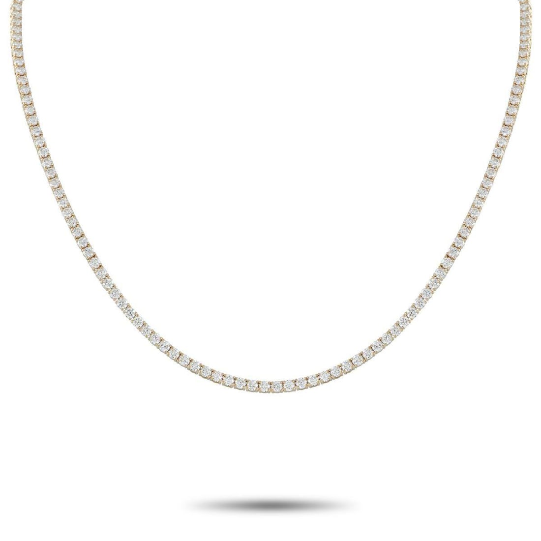 14K YELLOW GOLD 11.10CT LAB-GROWN DIAMOND TENNIS NECKLACE: This tennis necklace exudes classic elegance. Set in 14K Yellow Gold, Lab Grown Diamonds with a total weight of 11.10 carats continually catch the light from every angle. This piece measures 17 long