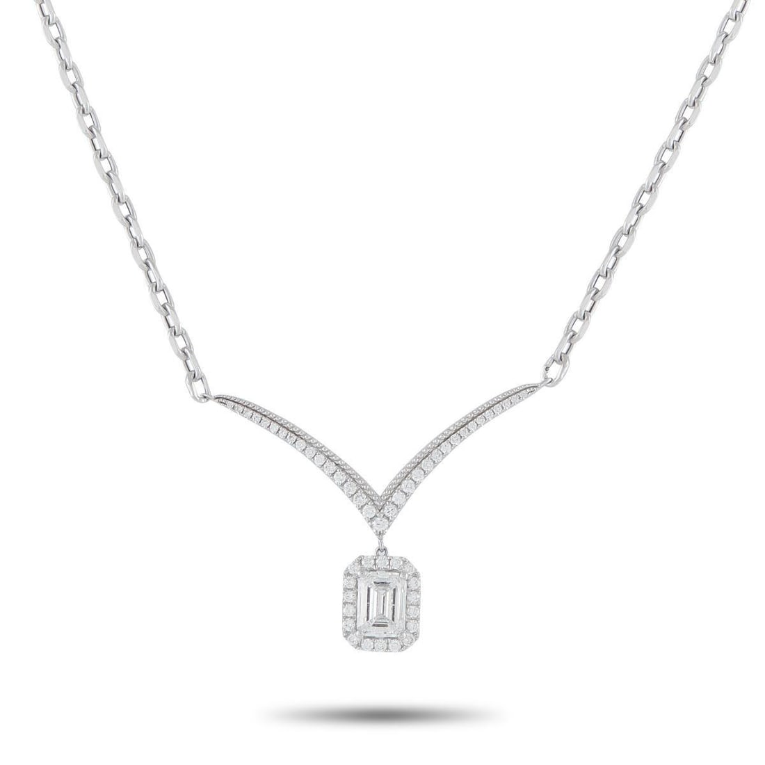 18K WHITE GOLD 1.33CT DIAMOND NECKLACE: A delicate design makes this necklace an exquisite addition to any ensemble. The 1.03 carat Diamond center stone dangles delicately from the sleek pendant, while additional Diamond accents totaling 0.