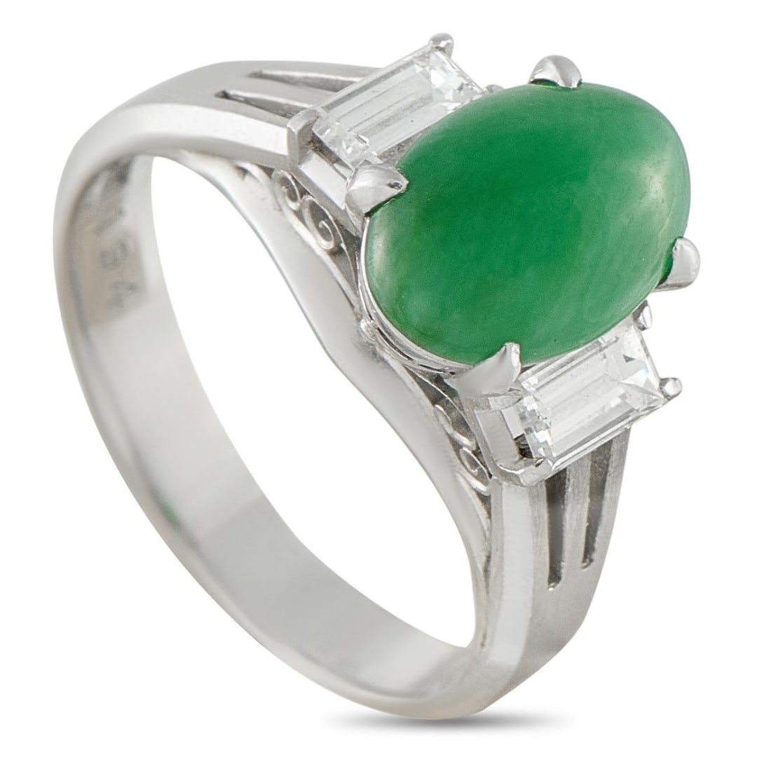PLATINUM 0.44CT DIAMOND AND JADE RING: This rings Platinum setting is filled with exquisite details. Breathtaking from every angle, this piece beautifully showcases a 1.94 carat Jade cabochon and Diamond accents totaling 0.44 carats. Ideal