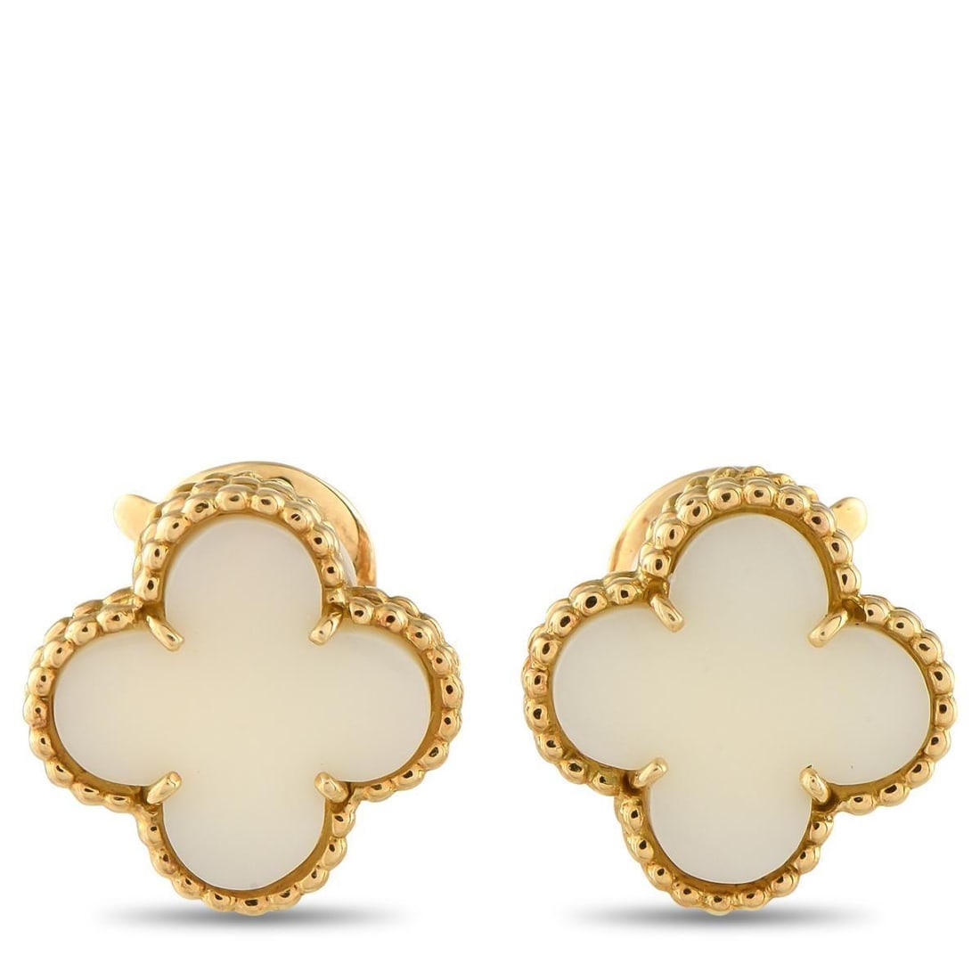 VAN CLEEF & ARPELS VINTAGE ALHAMBRA 18K YELLOW GOLD WHITE CORAL CLIP-ON EARRINGS: Featuring Van Cleef & Arpels' iconic four-leaf clover motif, these yellow gold clip-on earrings feature a white coral inlay that captures understated beauty perfectly. Set in delicate bead metalwork,