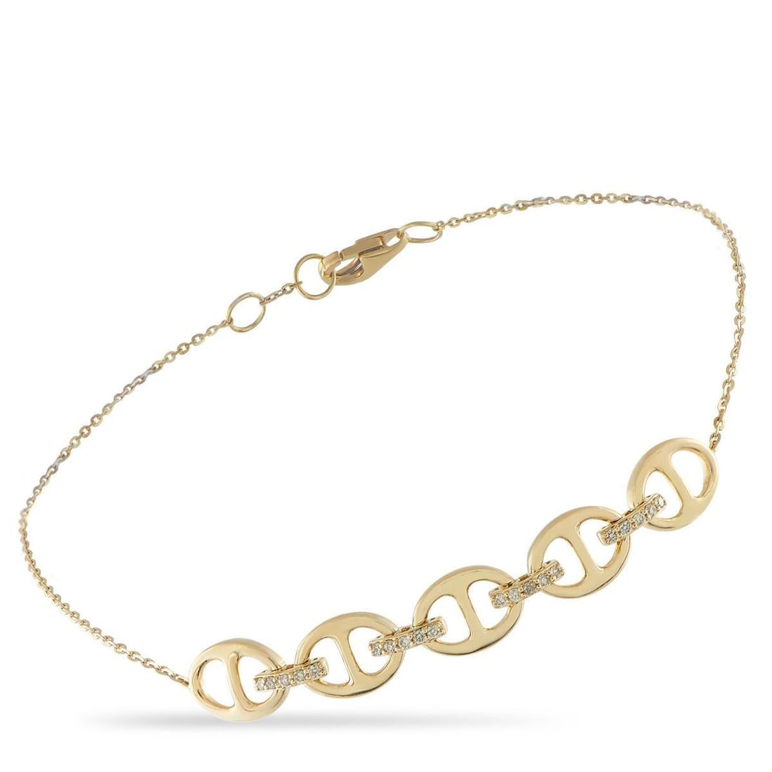 14K YELLOW GOLD 0.10CT DIAMOND BRACELET: This 14K Yellow Gold bracelet features a classically elegant design that will never go out of style. Incredibly luxurious, the chain motif at the center comes to life thanks to Diamond accents totalin
