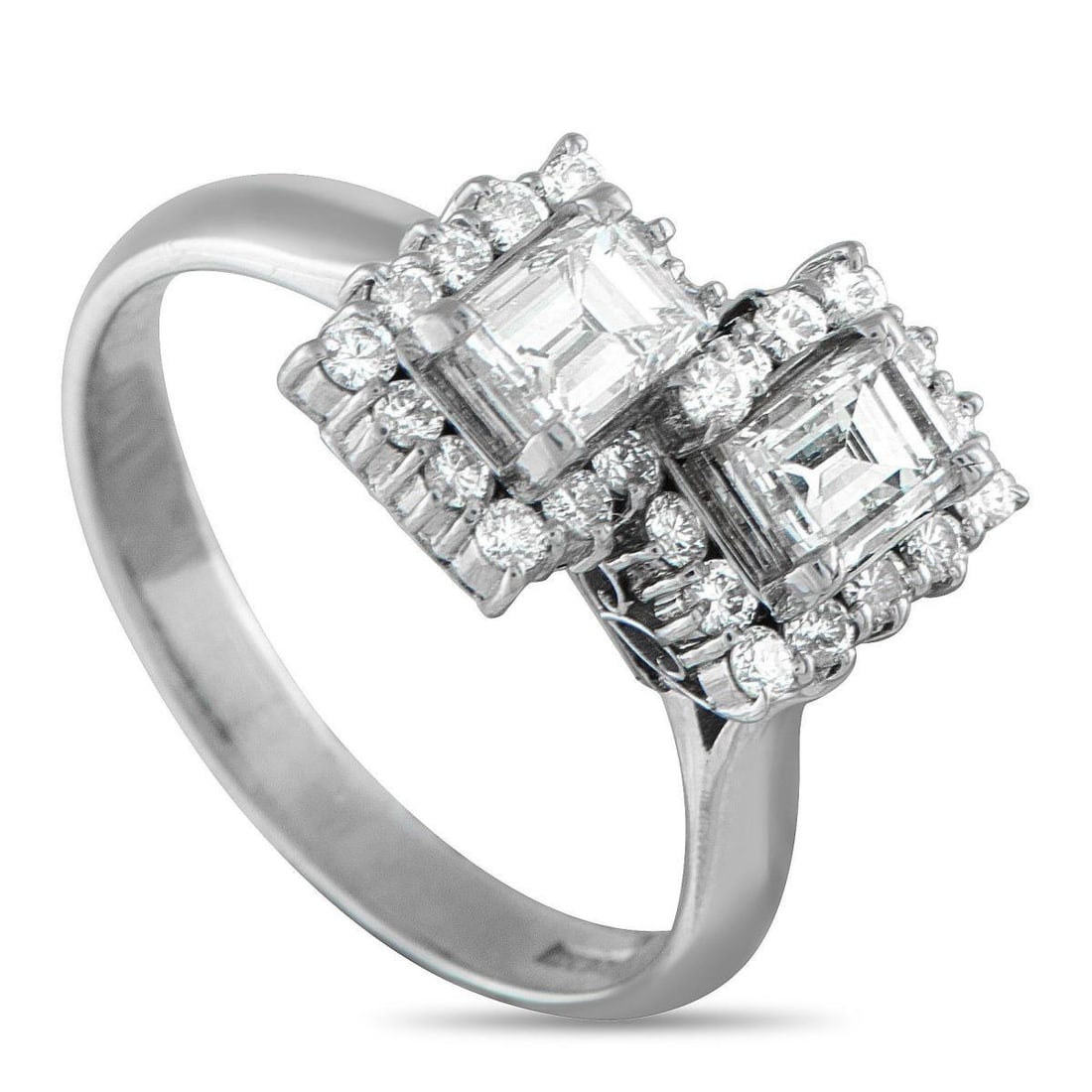 PLATINUM 1.74CT DIAMOND RING: This simple, stylish ring offers a stunning twist on tradition. The Toi Et Moi design comes complete with twin Diamond center stones, meant to symbolize an endless connection between two people. Set i