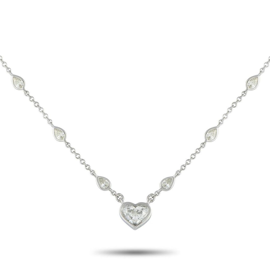 18K WHITE GOLD 3.81CT DIAMOND HEART NECKLACE: This stylish necklace will continually make a statement. Sparkling Diamonds with a total weight of 2.30 carats elevate the delicate chain. A heart-shaped pendant at the center shines to life thanks