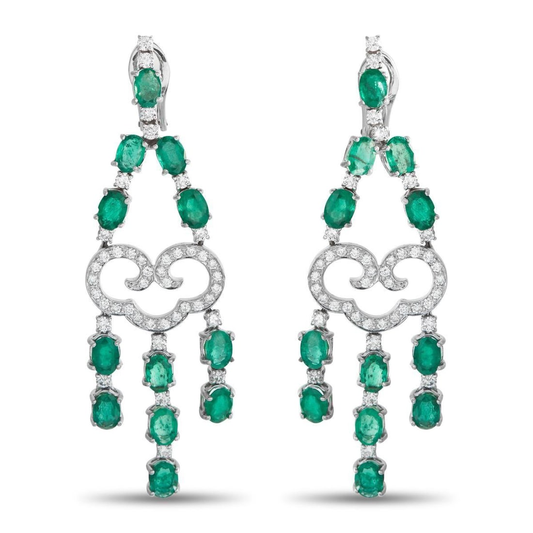 18K WHITE GOLD 1.50CT DIAMOND AND EMERALD DANGLE EARRINGS: These luxury earrings are elegant enough for even your most special occasions. Crafted from 18K White Gold, the intricate design is elevated by sparkling Diamonds totaling 1.50 carats. Emeralds with a