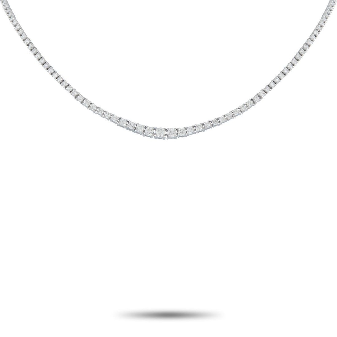 18K WHITE GOLD 5.39CT DIAMOND TENNIS NECKLACE: This tennis necklace is a luxury piece that will complement any ensemble. Subtle yet statement-making, graduated Diamonds with a total weight of 5.39 carats make it endlessly impressive. Set in 18K Wh