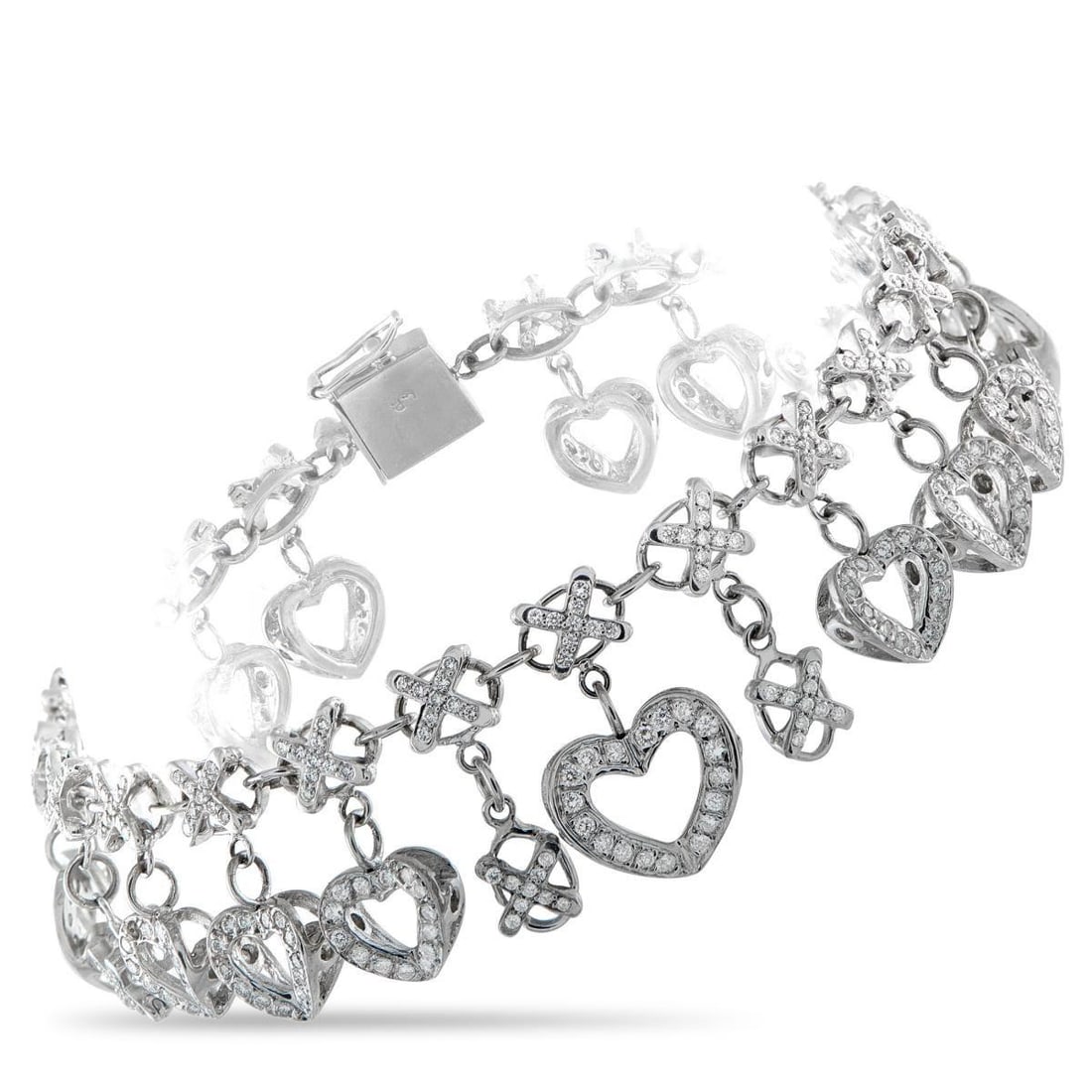 18K WHITE GOLD 2.5CT DIAMOND CHARM BRACELET: A white gold bracelet reimagining the classic Hugs and Kisses sentiment through a brilliant and playful design. It features X links traced in diamonds, forming a 7.25-inch chain. Suspended beneath eac