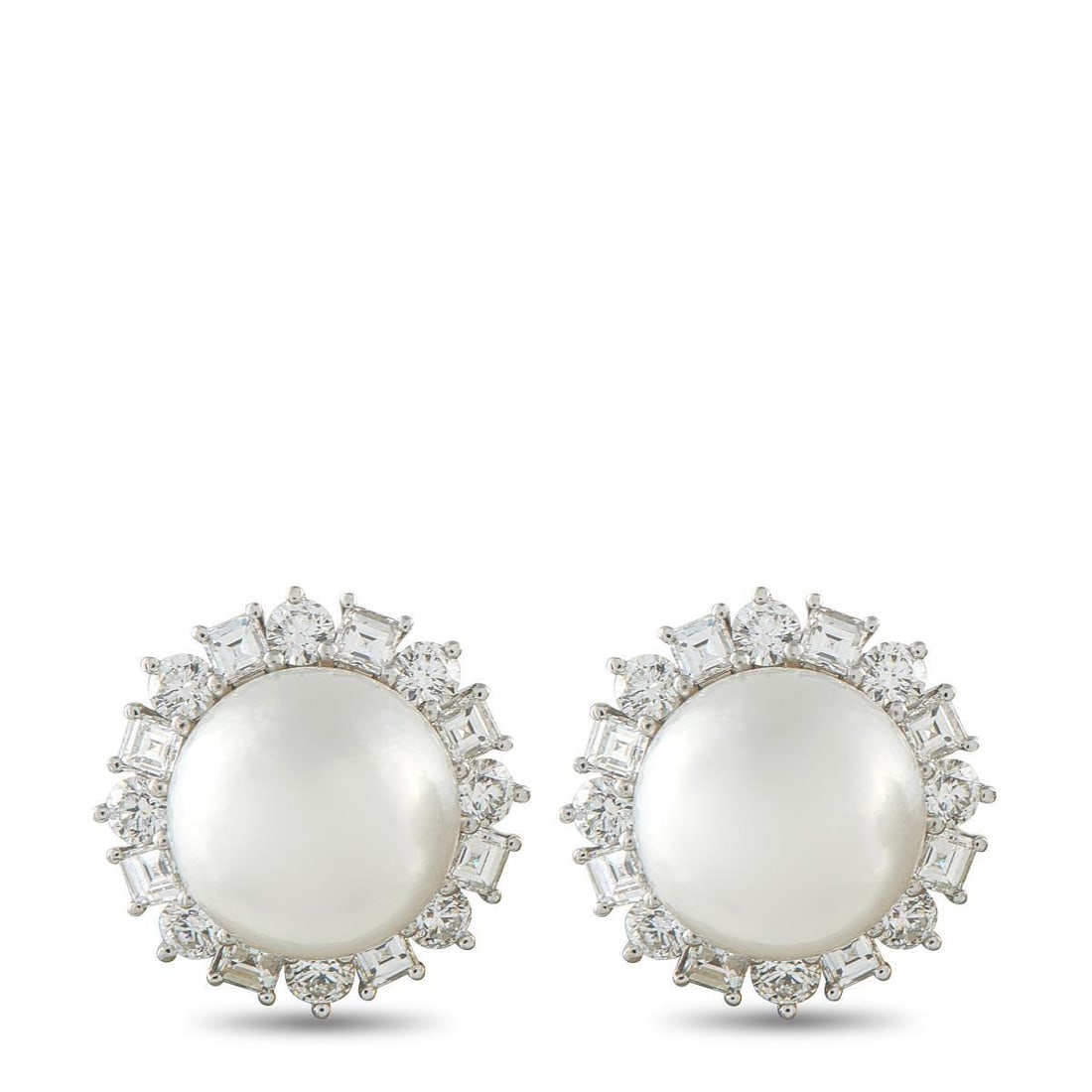 HARRY WINSTON PLATINUM 3.20CT DIAMOND AND PEARL EARRINGS: These Harry Winston earrings are incredibly sophisticated. Luminous 13.2mm Pearls make a statement at the center, while a halo of Diamonds effortlessly accents each earring. Together, they feature Dia