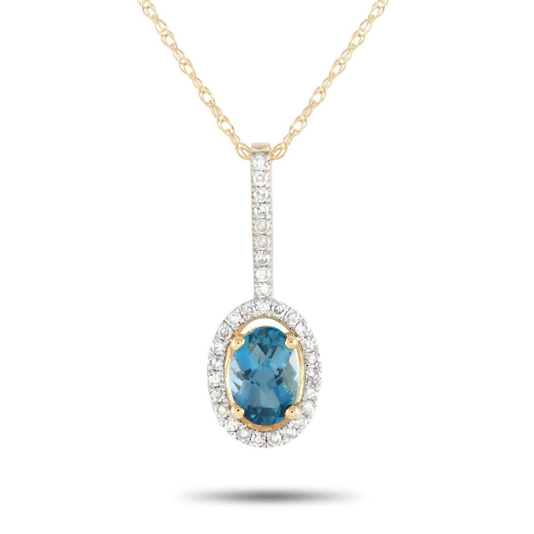 14K YELLOW GOLD 0.09CT DIAMOND AND BLUE TOPAZ PENDANT NECKLACE: Add luxury to your daily style with this diamond and blue topaz necklace. It is crafted in 14K yellow gold, with a double cable chain measuring 18 inches long. The bail shimmers with petite round diam