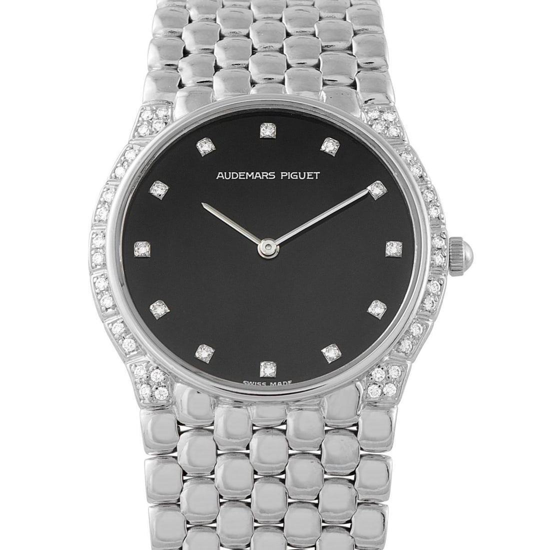 AUDEMARS PIGUET COBRA DIAMOND AND WHITE GOLD WATCH: A Cobra from the 90s. This Audemars Piguet time-only watch in white gold features a 31mm case flowing directly into an integrated bracelet with a supple, serpentine profile. Its black dial is set with