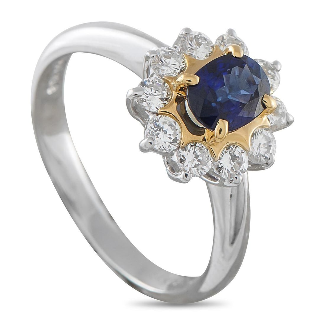 PLATINUM AND 18K YELLOW GOLD 0.58CT DIAMOND RING: This luxury ring is a timeless piece that will instantly draw the eye. At the center, a 0.83 carat Sapphire contrasts against a lustrous 18K Yellow Gold accent. A halo of sparkling Diamonds with a tot