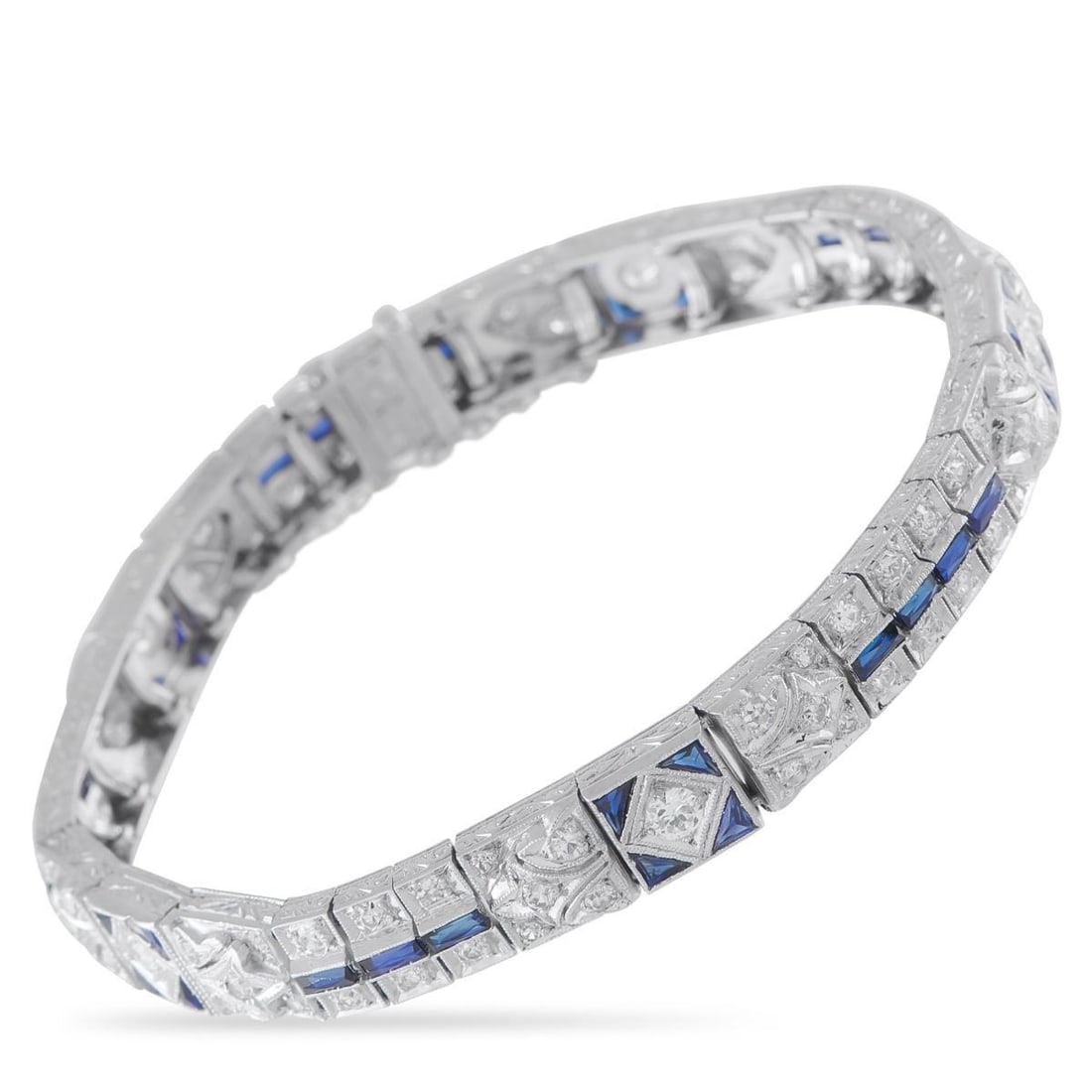 ART DECO PLATINUM 2.70CT DIAMOND AND SAPPHIRE BRACELET: This impeccable bracelet features all the hallmarks of the Art Deco era. Sparkling Diamonds with a total weight of 2.70 carats make a statement from their place within the simple Platinum setting. Sap