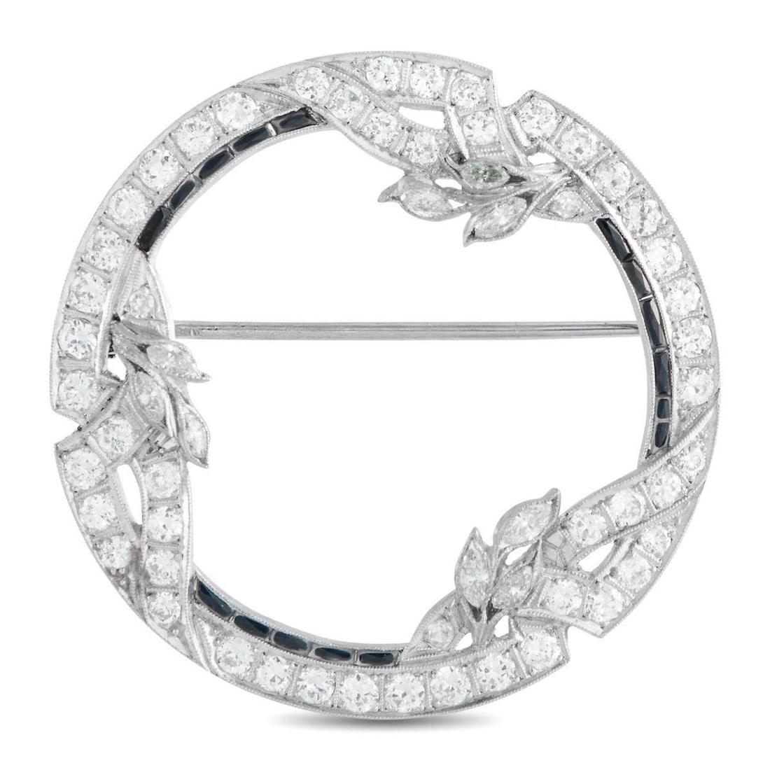 ART DECO PLATINUM 1.70CT DIAMOND AND SAPPHIRE BROOCH: With an intricate Platinum setting and a stunning openwork design, this circular Art Deco brooch exudes timeless elegance. Diamonds with a total weight of 1.70 carats allow it to sparkle and shine