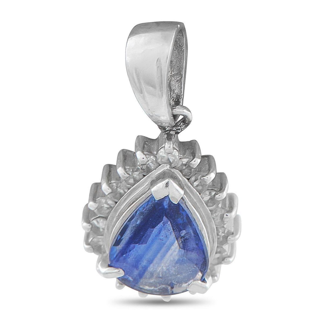 PLATINUM 0.15CT DIAMOND AND SAPPHIRE PENDANT: In this pendant, an oval sapphire sits upright in its setting, surrounded by a frame of small diamonds that gleam like tiny ice crystals. The halo frames the blue stone precisely, emphasizing its