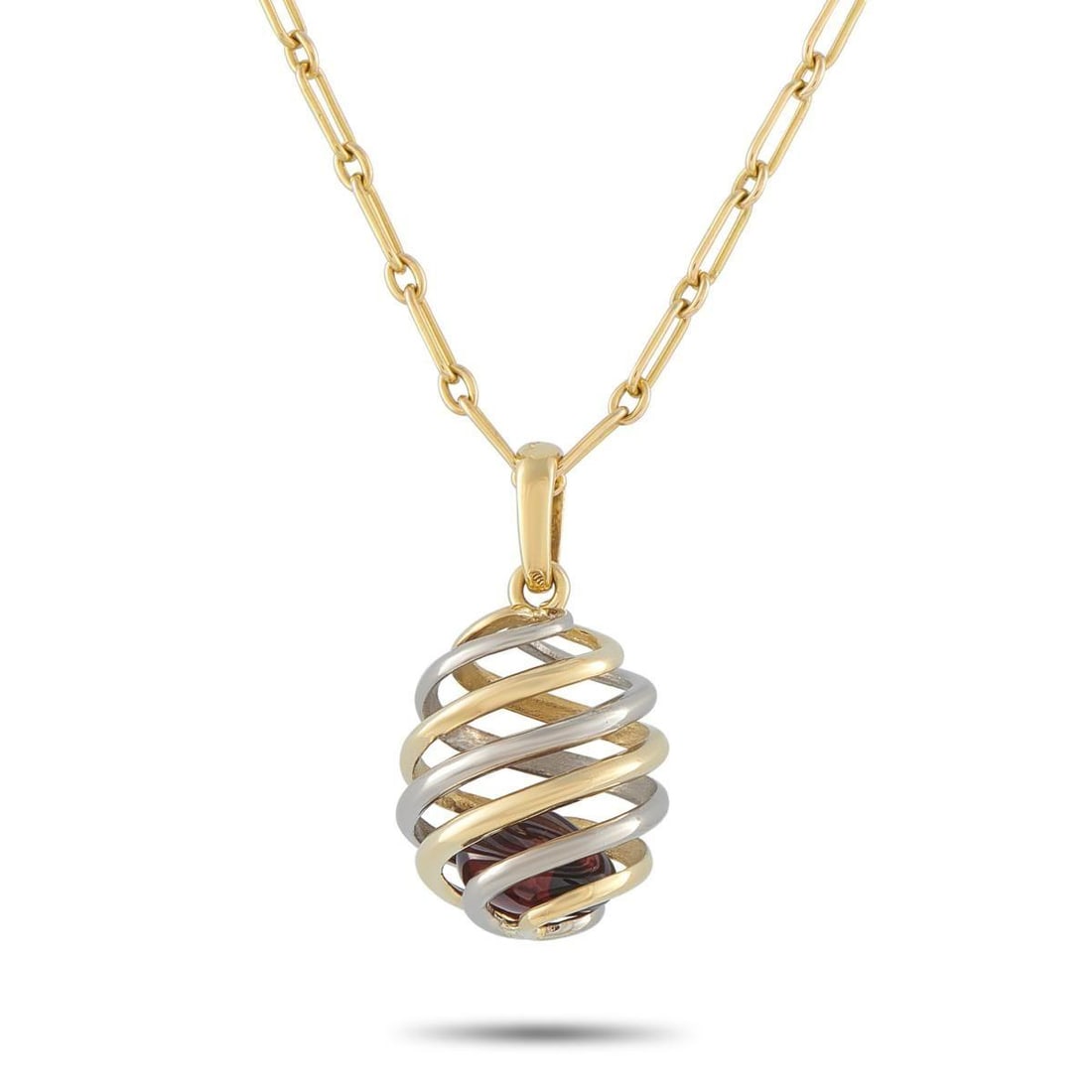 CARTIER VINTAGE 18K YELLOW GOLD PENDANT NECKLACE: This vintage Cartier necklace will add a touch of old fashioned elegance to any ensemble. Suspended from a 17.5 chain, the hollow pendant contains a captivating stone at the center. Crafted from 18K Y